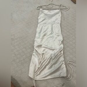 Hello Molly Gold Mini Dress with ties on the bottom of dress